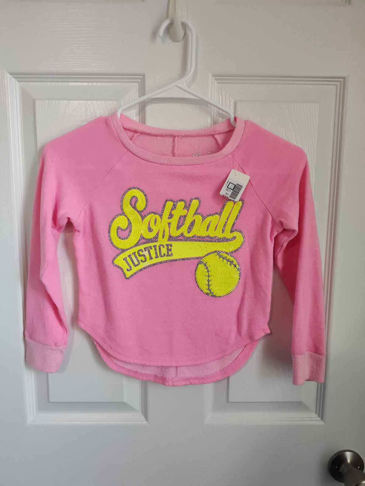 Seller 189:  Justice Softball girl's size 6 shirt