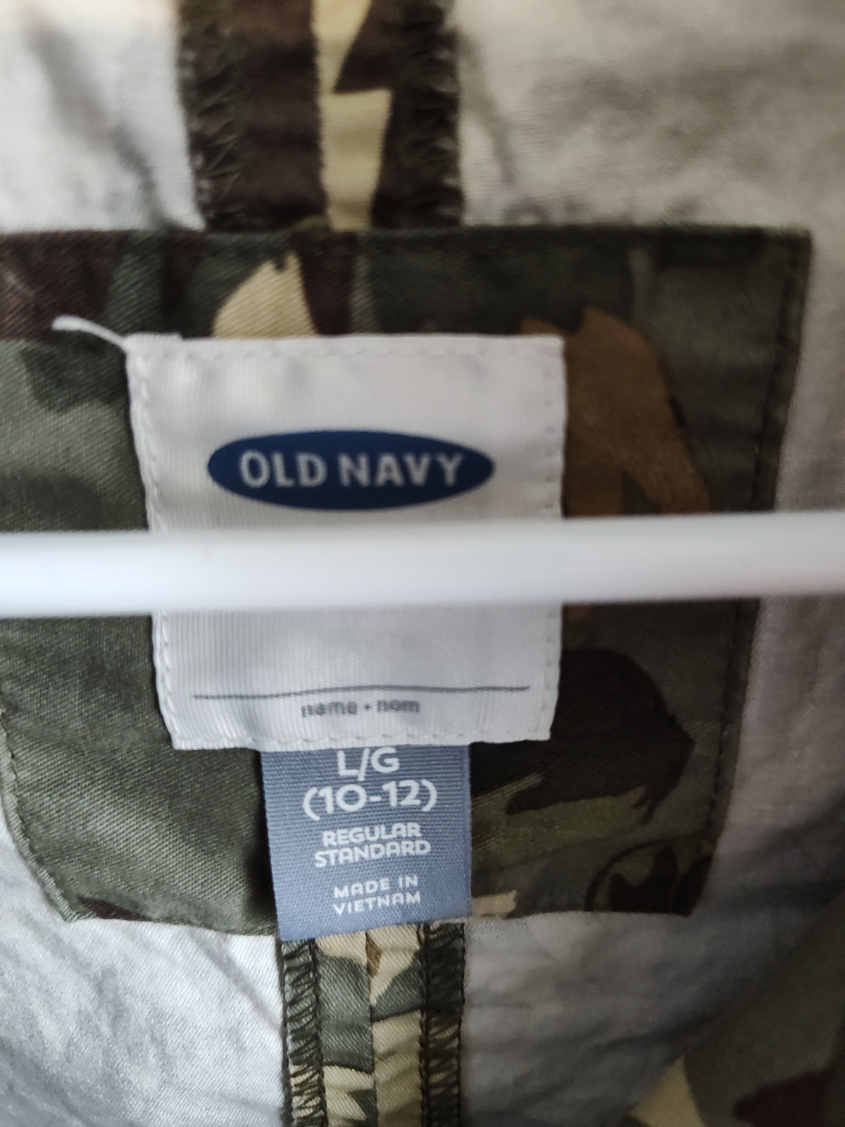 Seller 189:  Old Navy Leaf Patterned Hooded Jacket Girls size 10/12