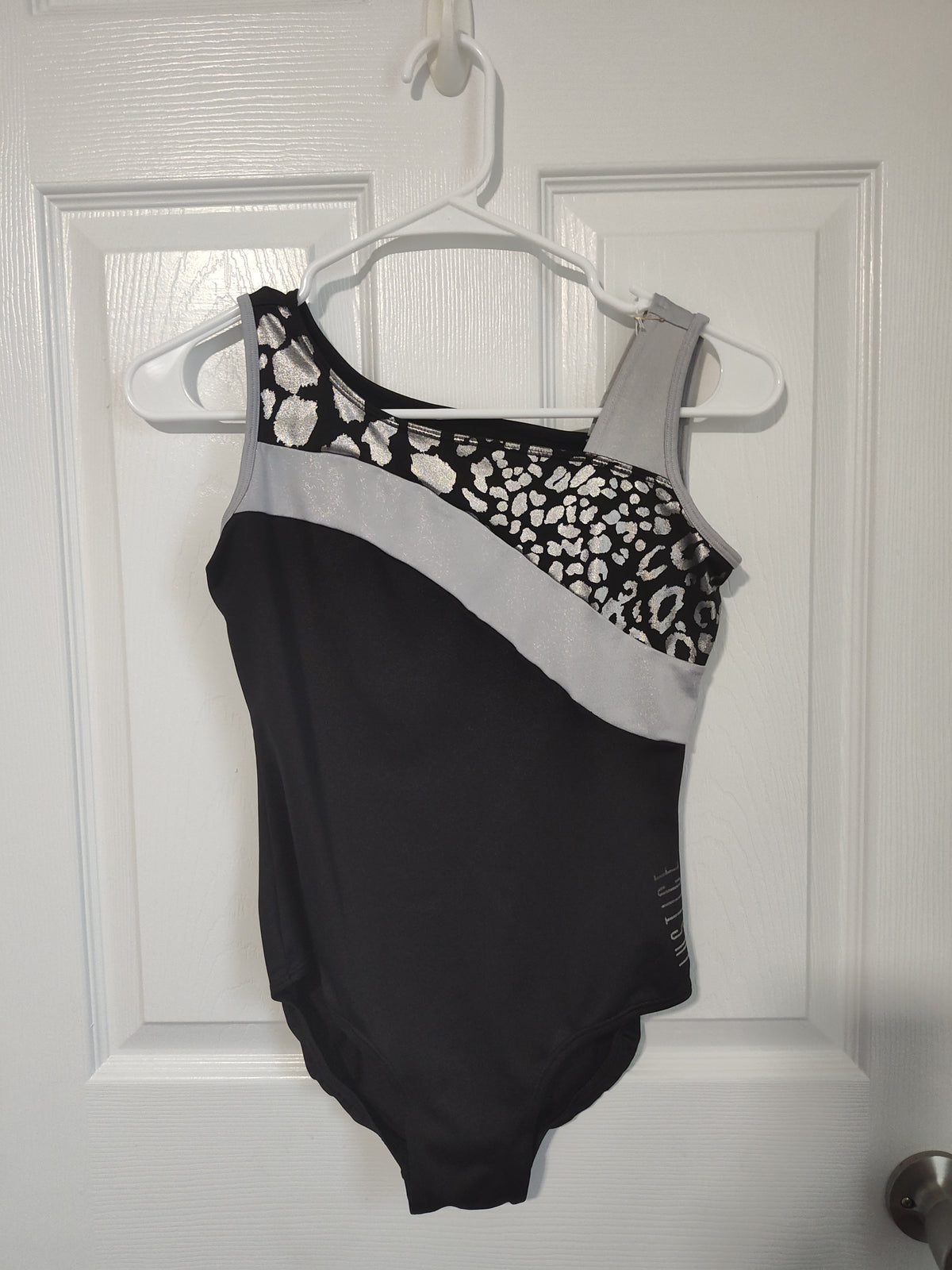 Seller 189:  Justice Gymnastics Leotard girls size 16