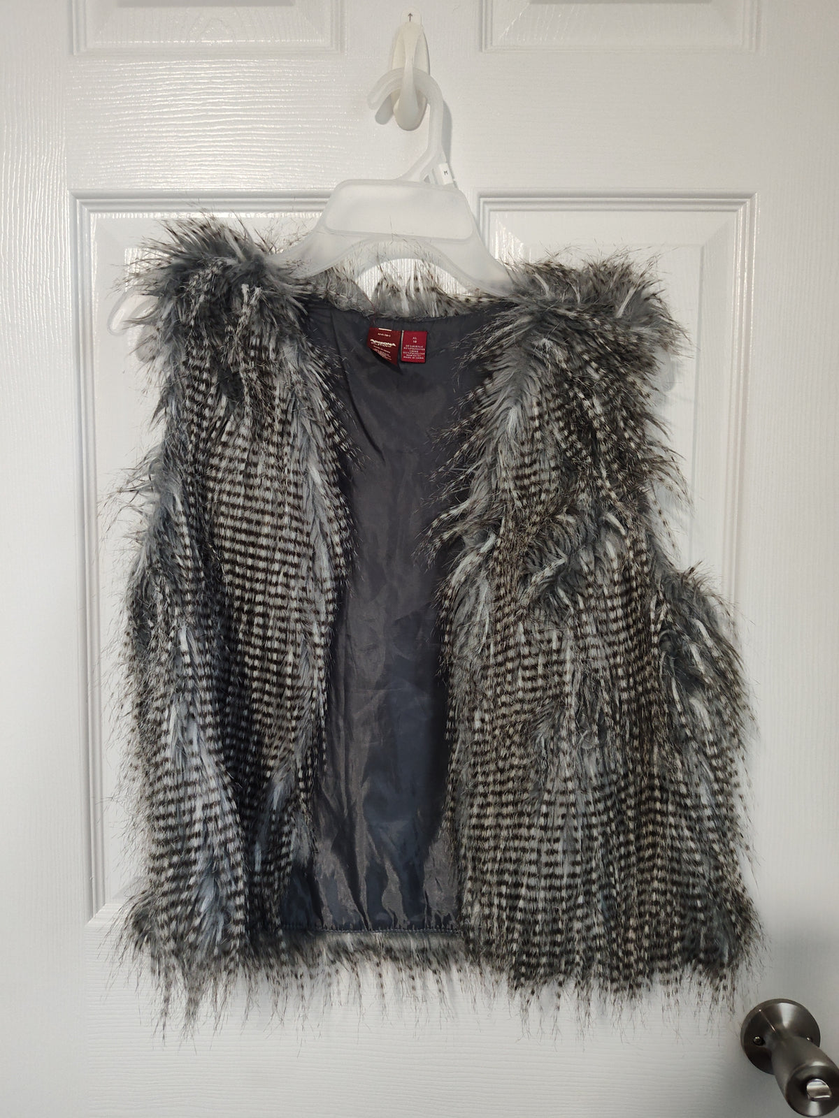 Seller 189:  Arizona Girl's faux feather vest size 16