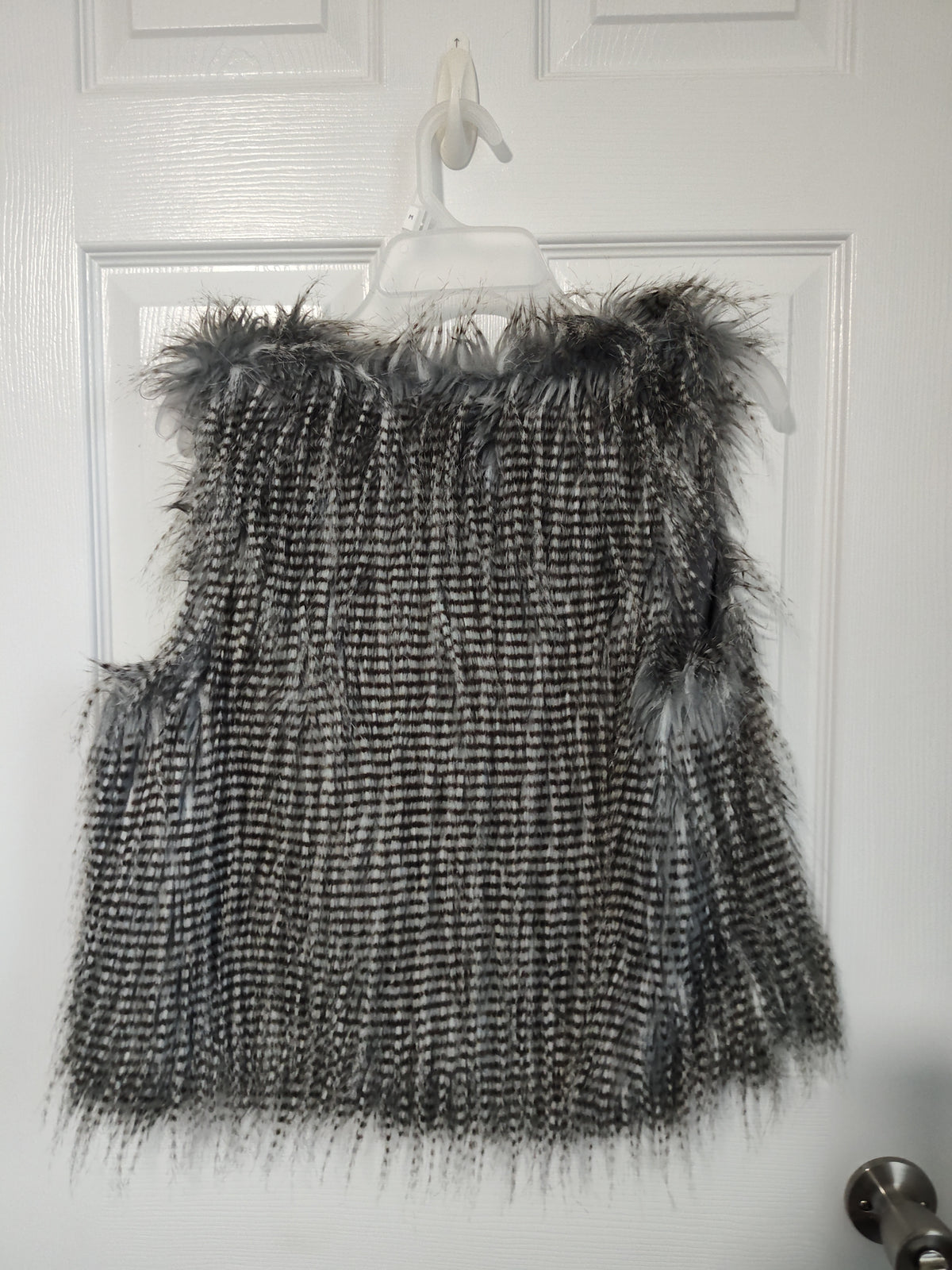 Seller 189:  Arizona Girl's faux feather vest size 16
