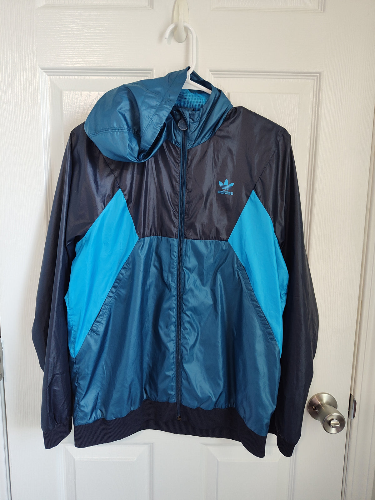 Seller 189:  Boys Adidas sweat/rain jacket size 13/14