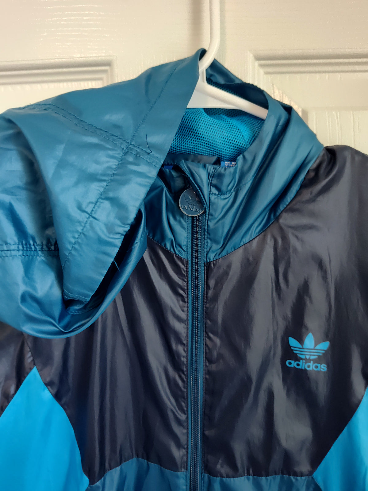 Seller 189:  Boys Adidas sweat/rain jacket size 13/14