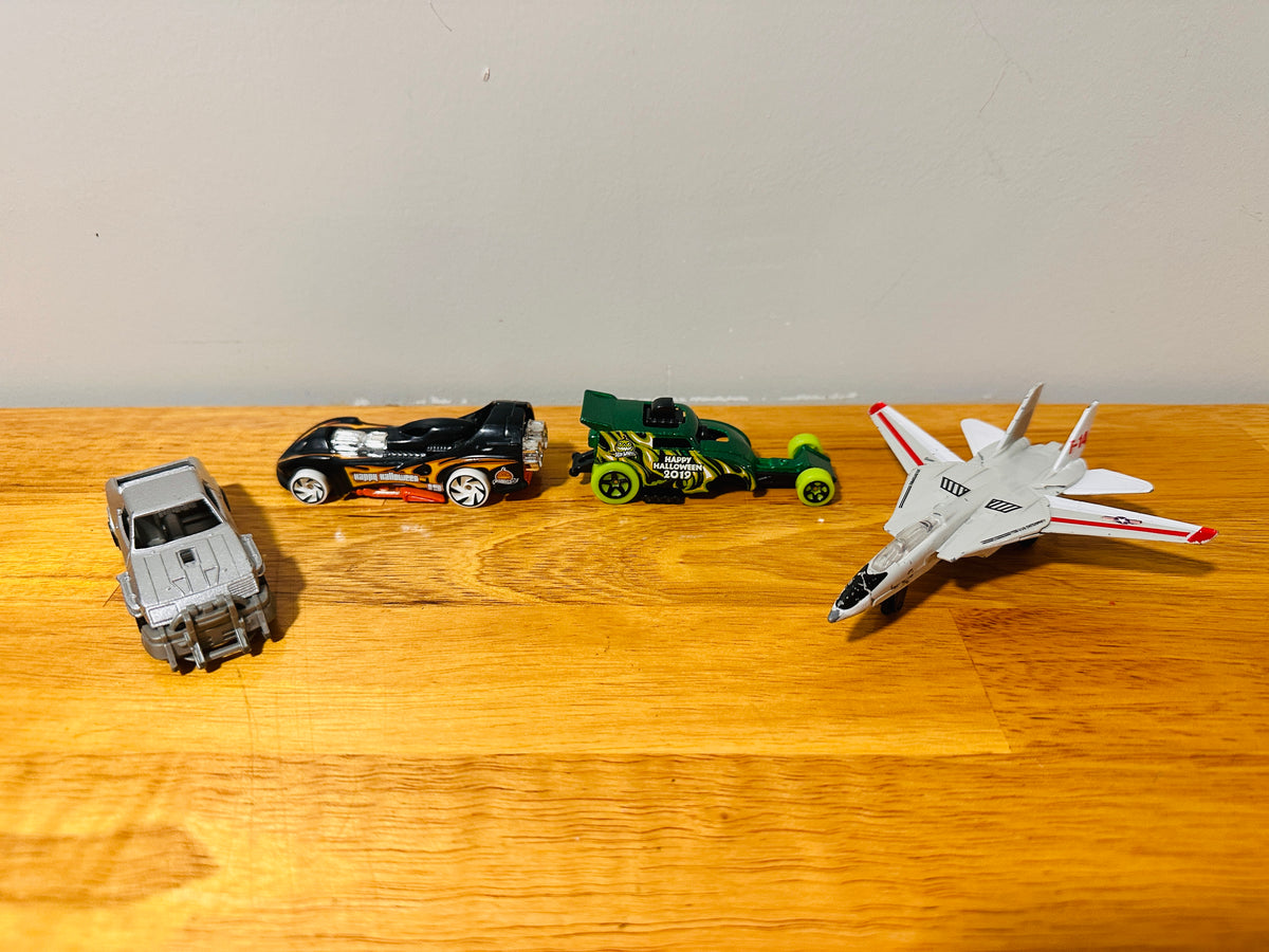 #163 4 Hot Wheels Vehicles