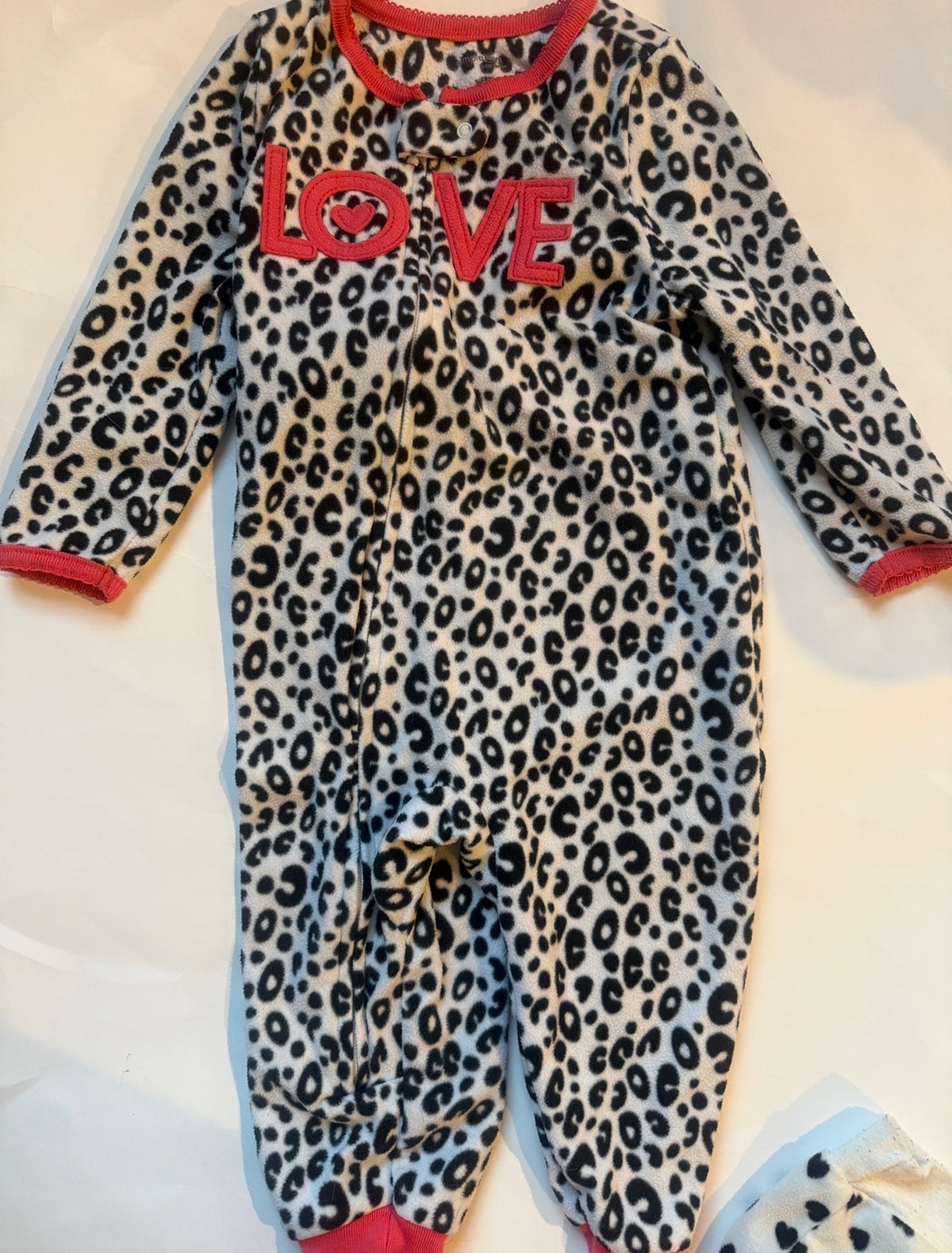 #170 carters pajama bundle (3)— fleece cheetah print “love” zip non foot pj, fleece white with black hearts and pockets and 2 piece cocoa helps me sleep monkey pjs girls 18 months