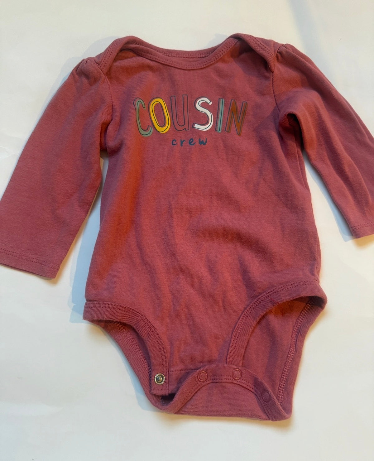 #170 Carters “cousin crew” pink body suit girls 6 months