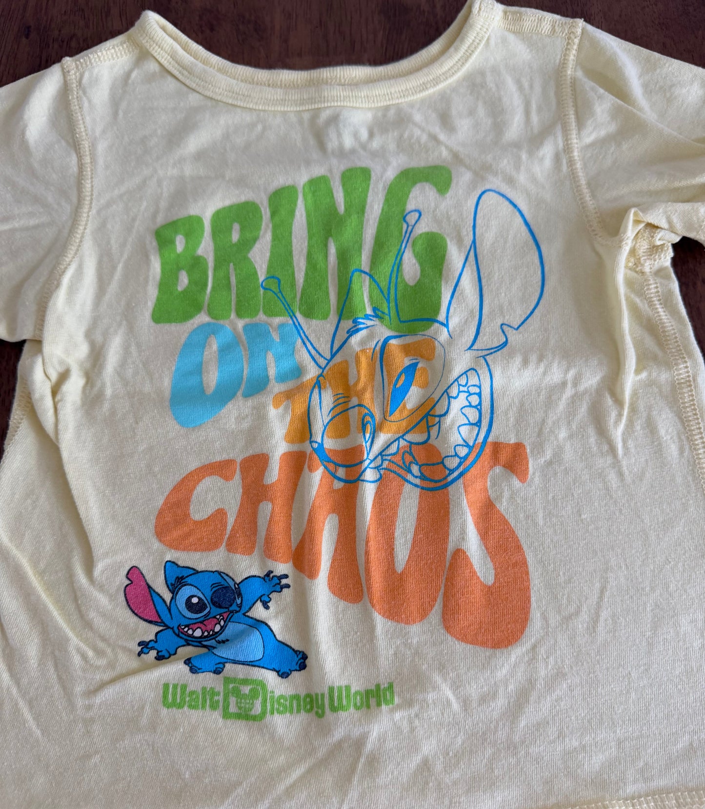*reduced* #117, Girls 4T, Disney yellow stitch shirt, VGUC