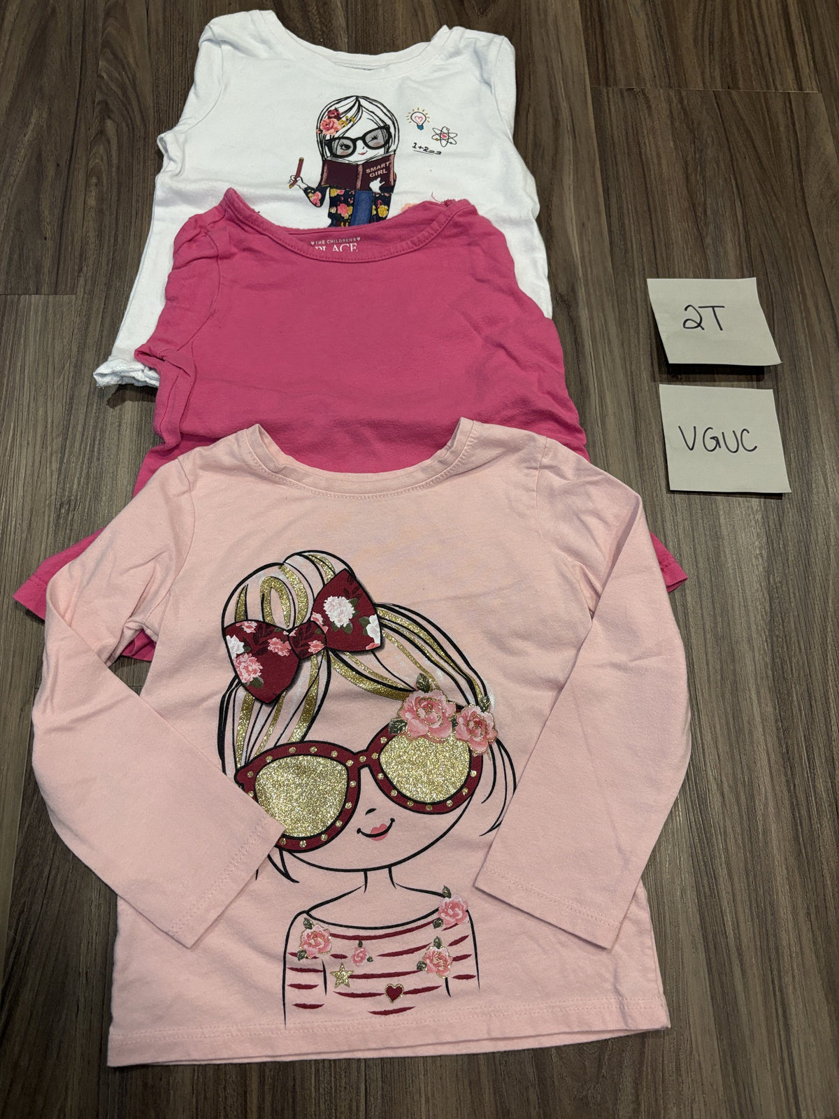 #138 - 2T VGUC (3) LS Shirts (pink girl, pink, white girl book)