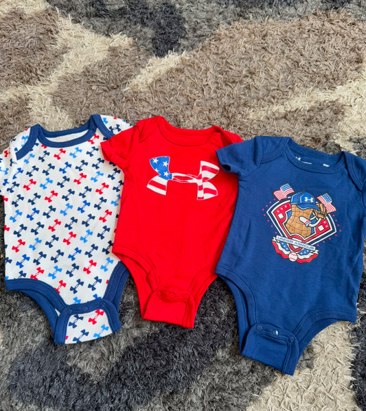 #74- Under Armour onesies 0-3 mo