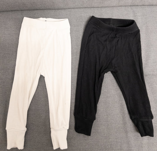 # 151.   Girls 6-12 month little bipsy pants. White and black