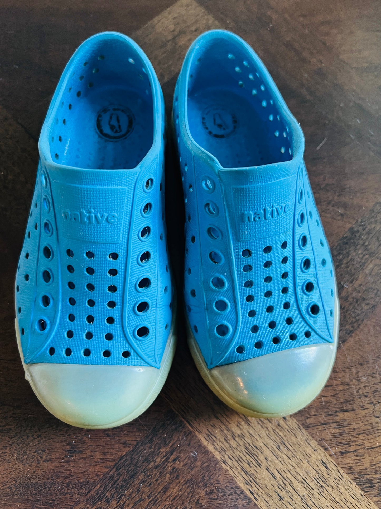 Native blue shoes, size 9, glow in dark