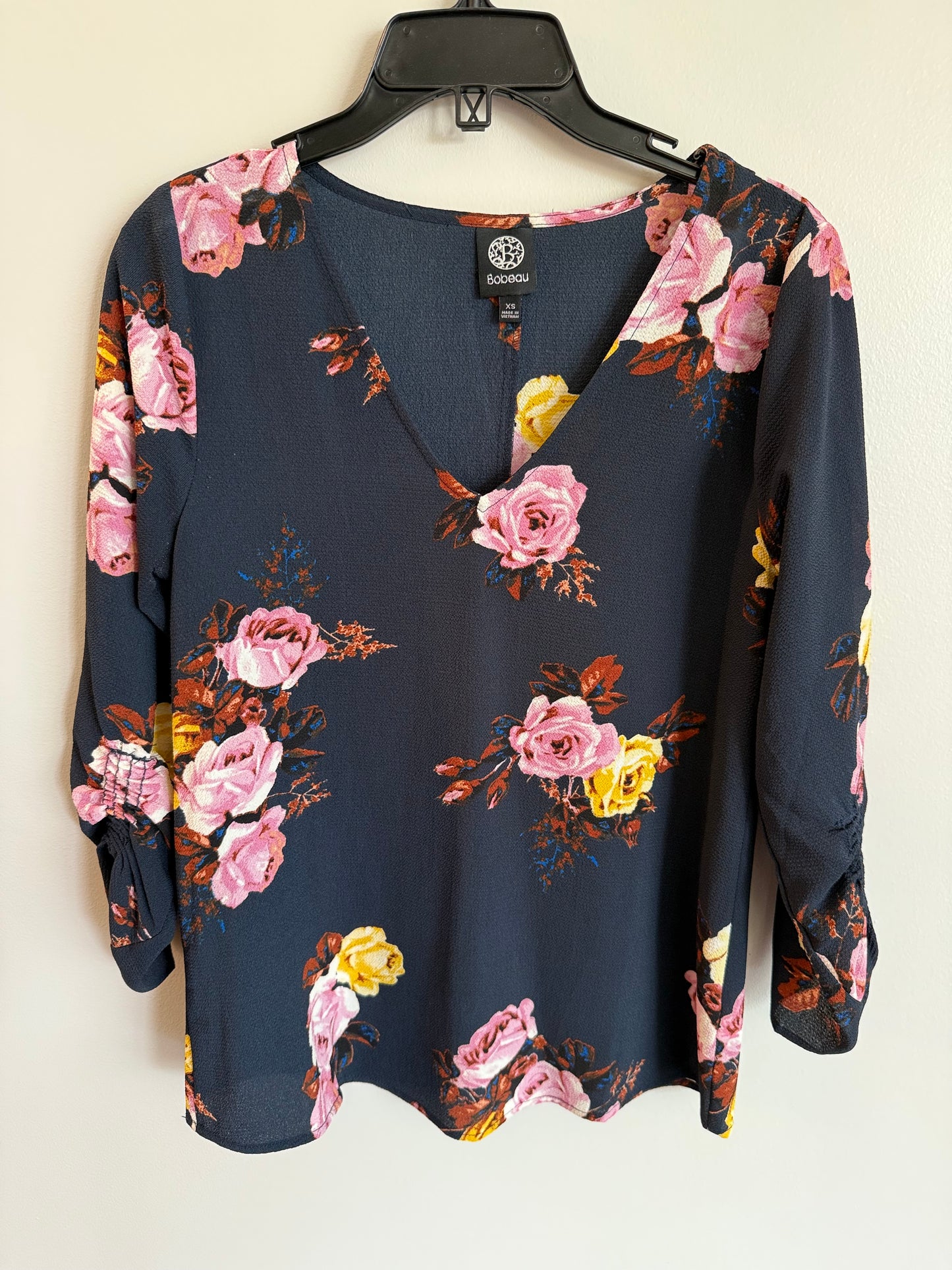 #173-women's navy floral blouse size XS