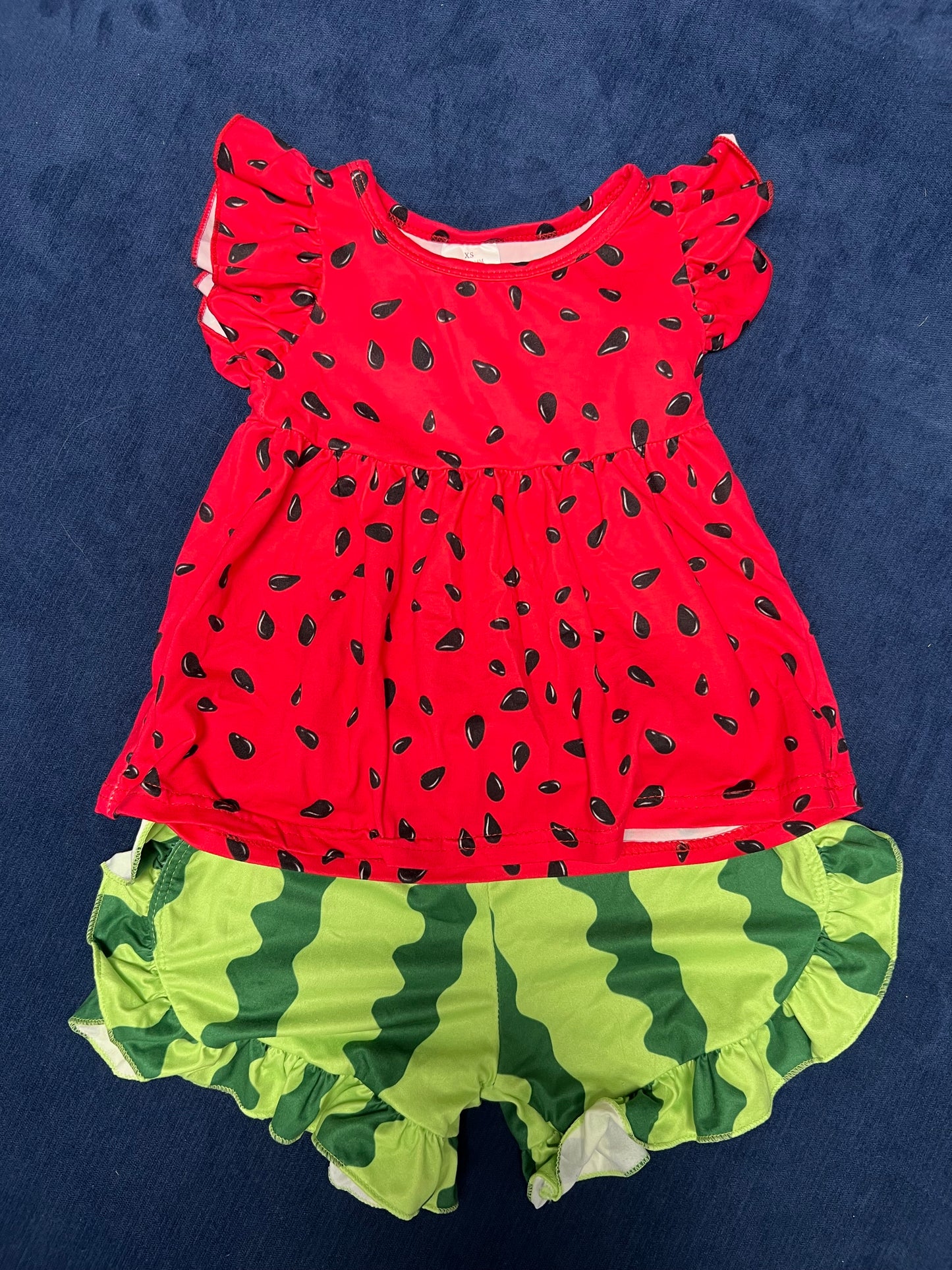 Toddler girl watermelon shirt/shorts set. Size listed as 12-18mo but fits like 24mo in my opinion. EUC.