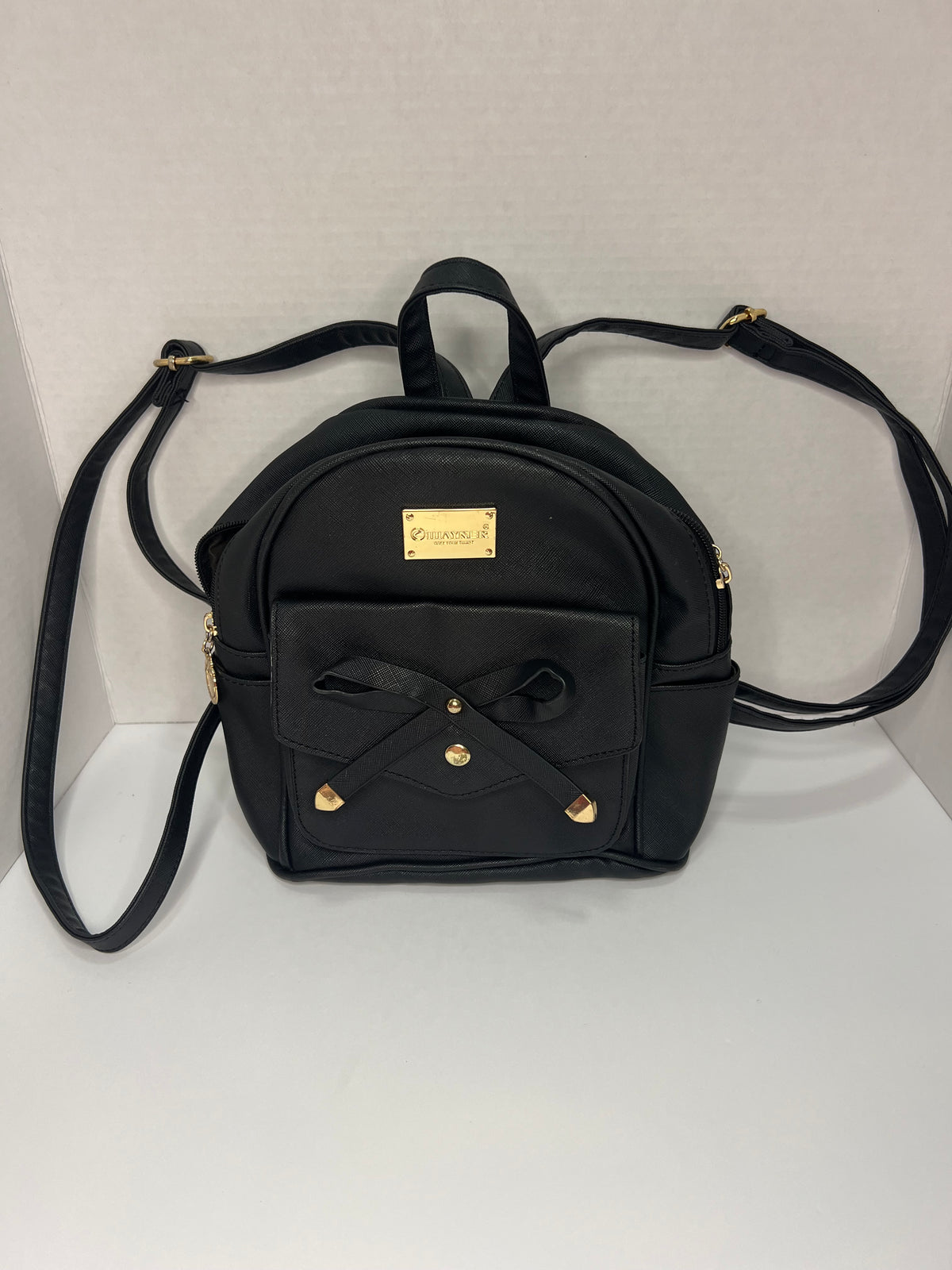 #180 small black backpack