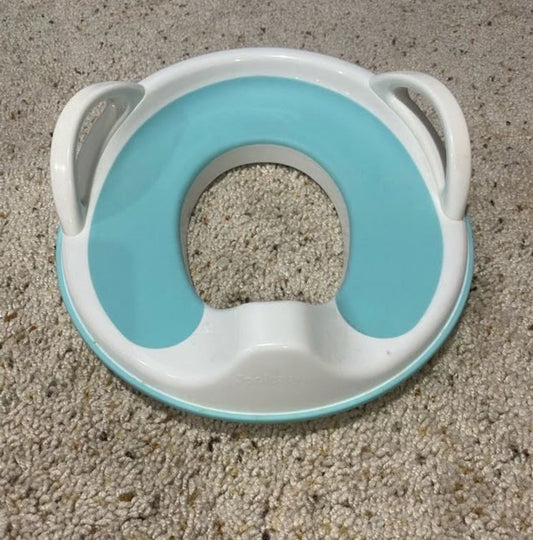 Seller #121 Potty training seat.  Sits on top of normal size toilet.