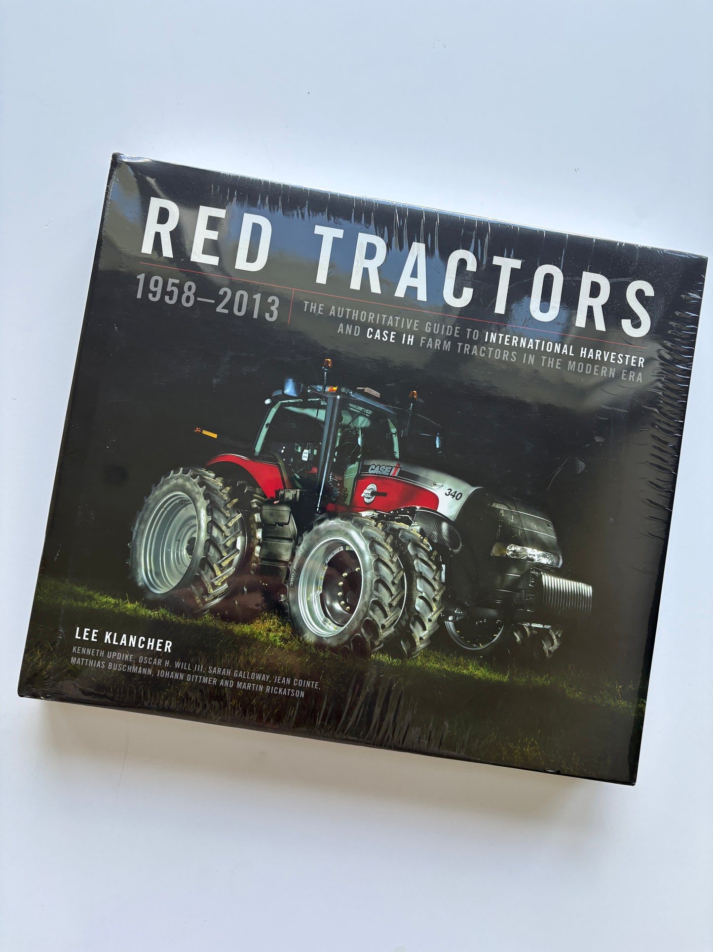 Seller #105 - Case Red Tractor Book NWT (still in plastic)