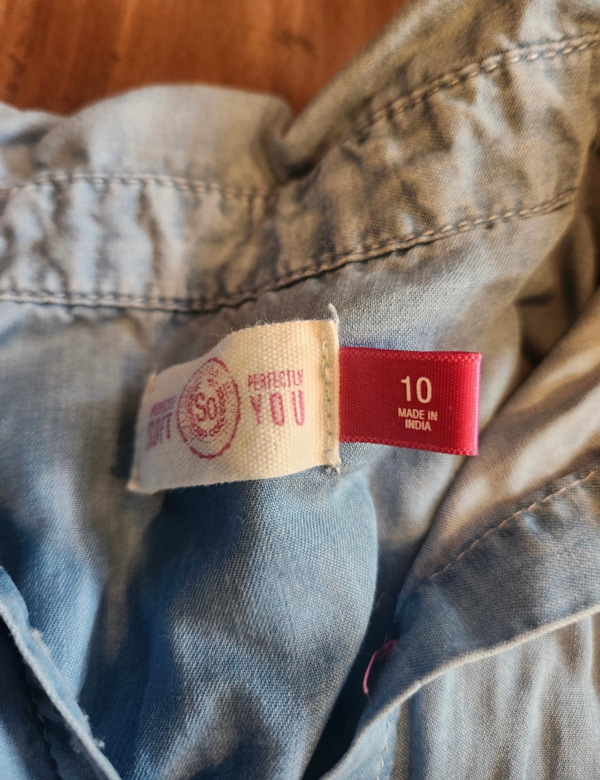 Seller #121 Girls chambray button up shirt size 10