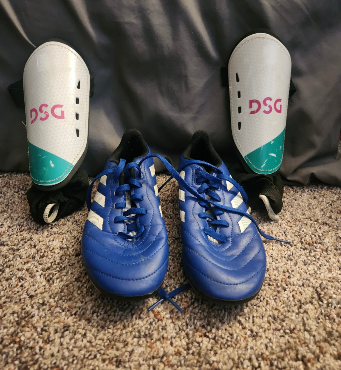 Seller #121 Size 3.5 Soccer cleats and shin guards