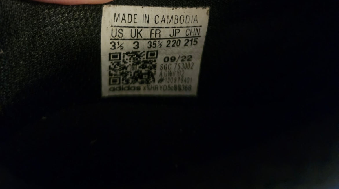 Seller #121 Size 3.5 Soccer cleats and shin guards