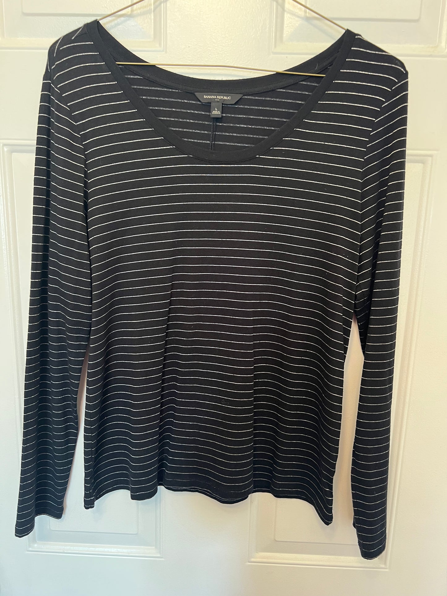 Banana Republic womens size large black with silver stripe long sleave top.