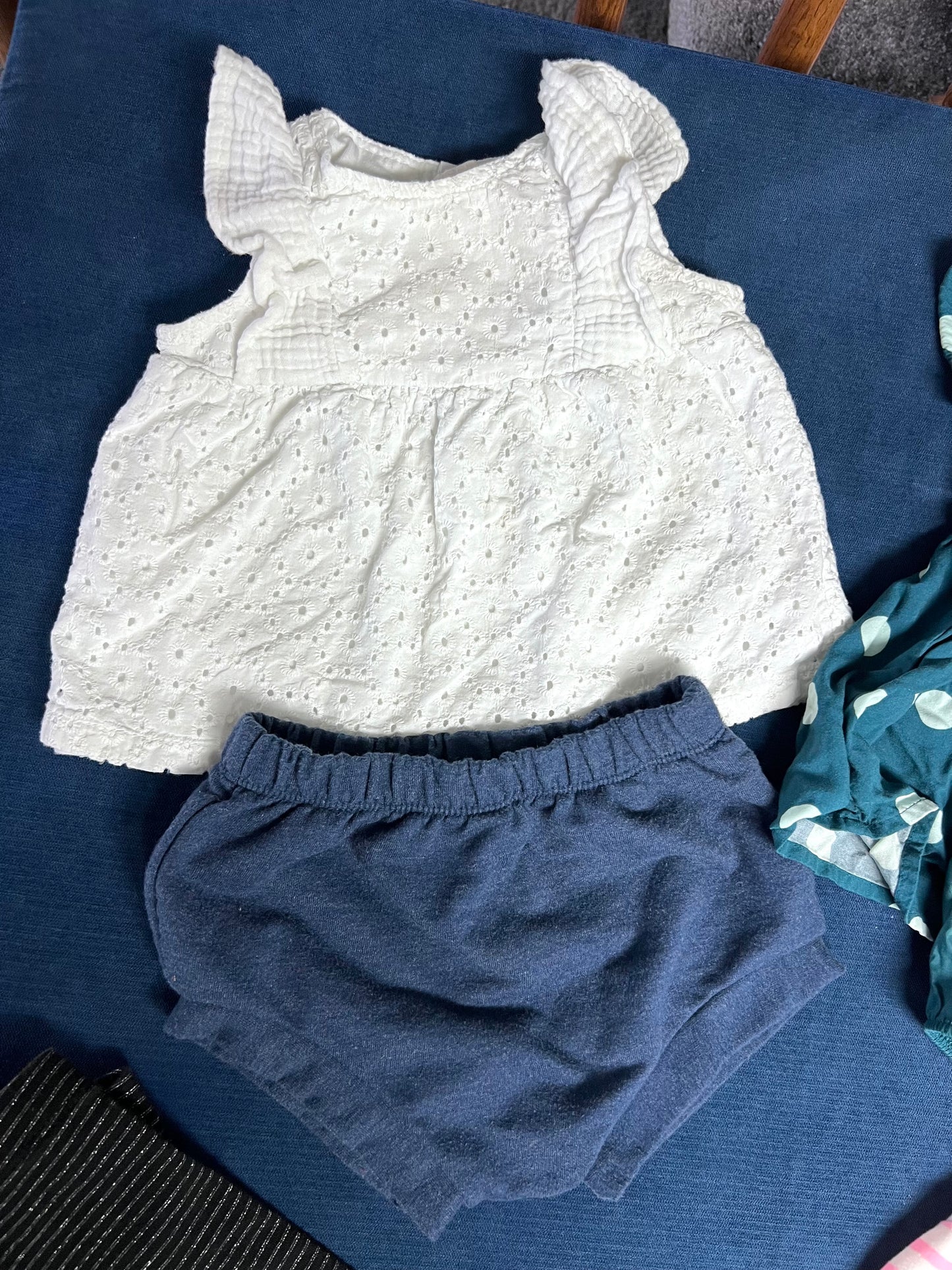 12mo baby girl bundle: black/silver leggings, navy shorties, white eyelet top with ruffle shoulders, teal polka dot dress with diaper cover, pink/cream striped shirt