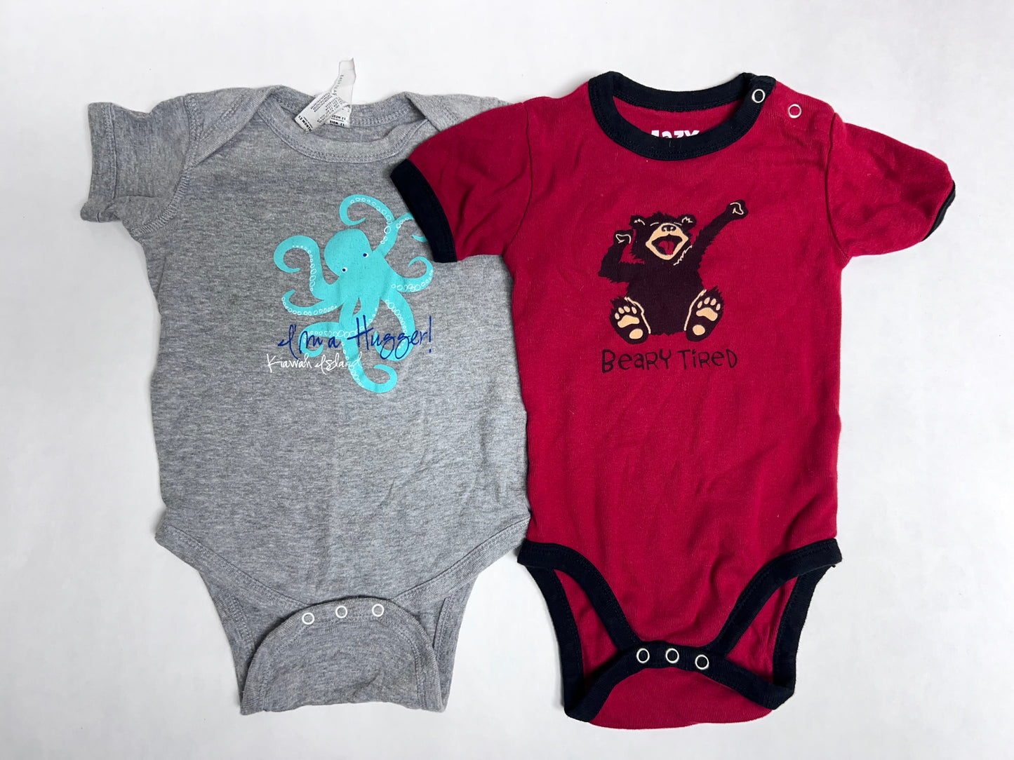 12mo onesie bundle; red ‘Beary tired’ with paw prints on bum, grey with octopus (‘I’m a hugger, Kiawah Island’). VGUC