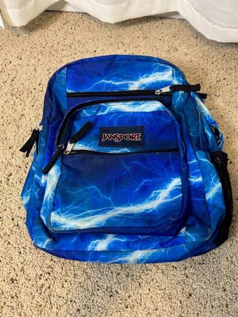 #210 Jansport Backpack, blue lightening