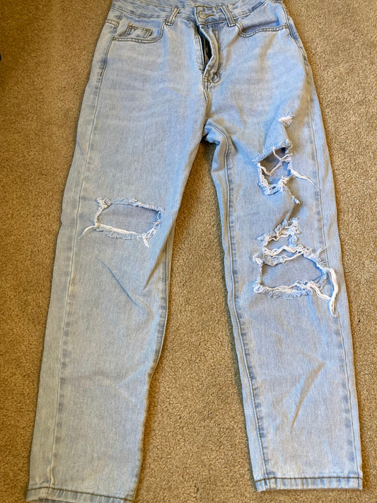 Seller #57 Girls 12 Destructed light wash jeans