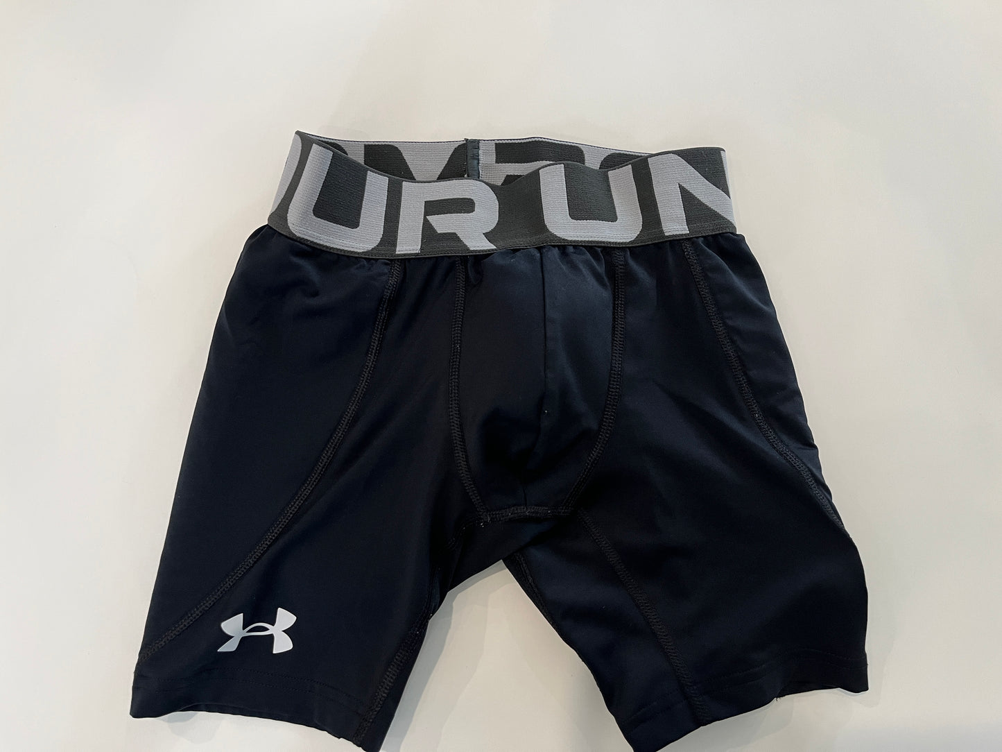 137 Under armour Youth Small sliding shorts with cup, EUC no holes