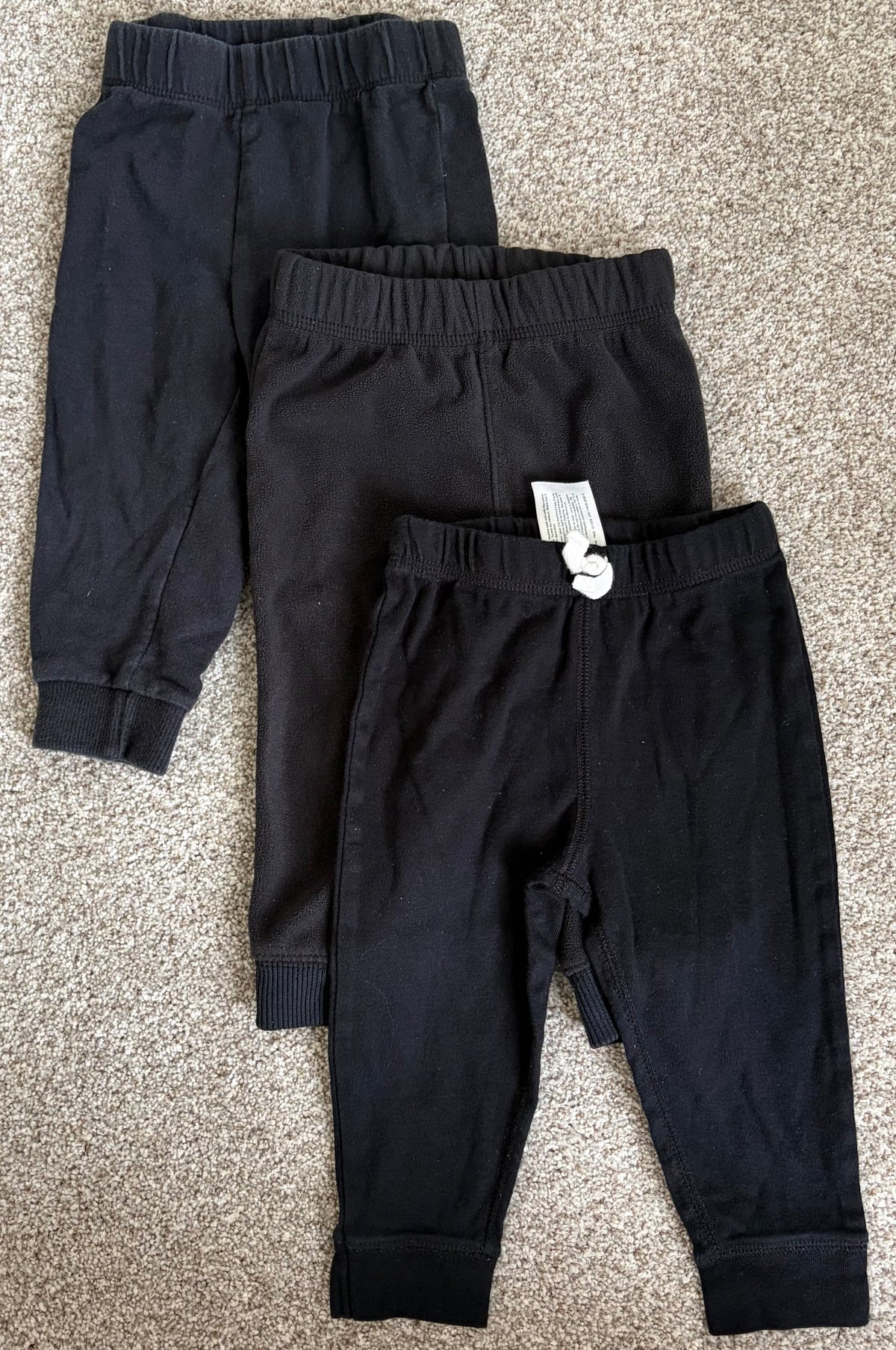 Seller #178 Set of 3 black Carter’s pants size 12mo