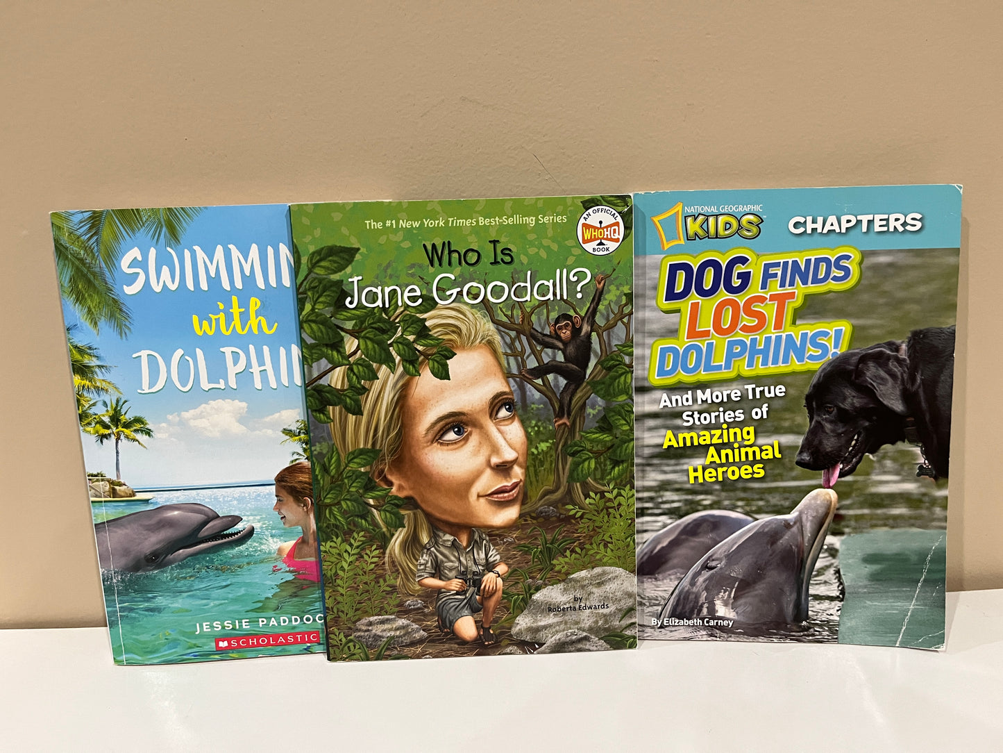 137 total 3 books about Jane Goodal and Dolphins, LN/ BN (multiple pictures of book info)