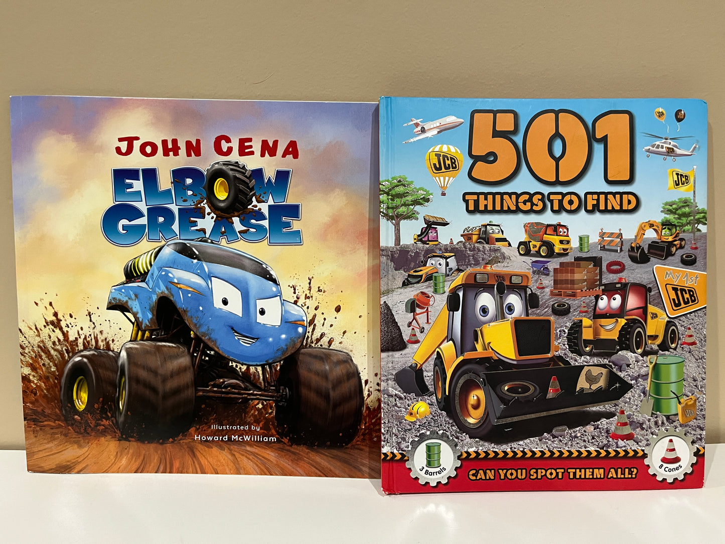 137 (2 books) Hard back and board paged 501 things to find construction, John Cena"s book Elbow Grease paperback book. LN