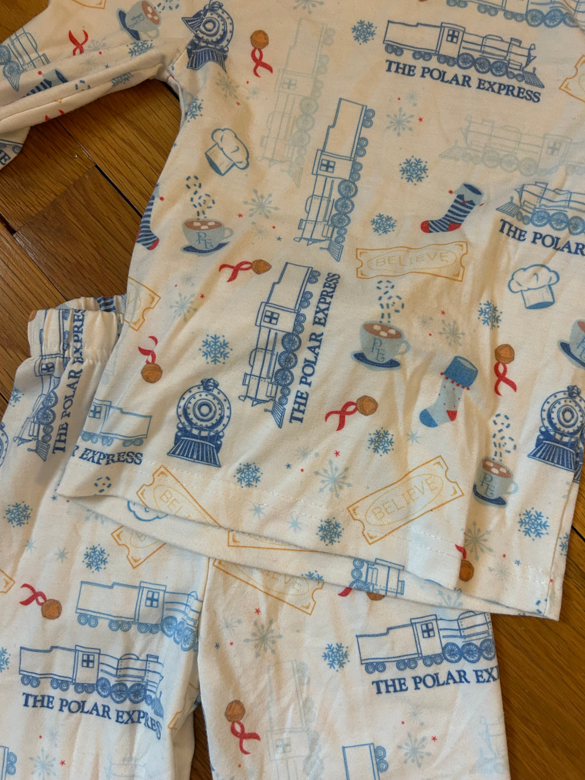 Seller 128 - Copper Pearl Boys 2T Polar Express Pajamas