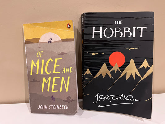 137 teen chapter books paperback the Hobbit and of mice and men. Has some writing in it.