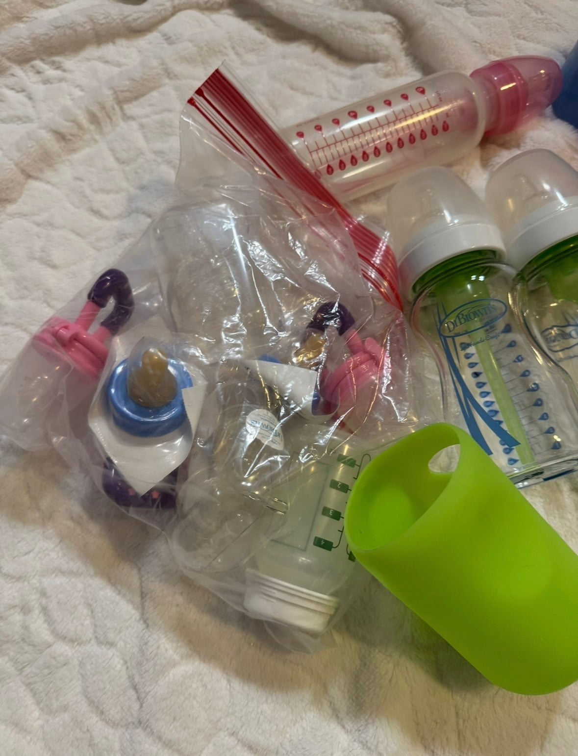 #53 multiple baby bottles and feeding supplies