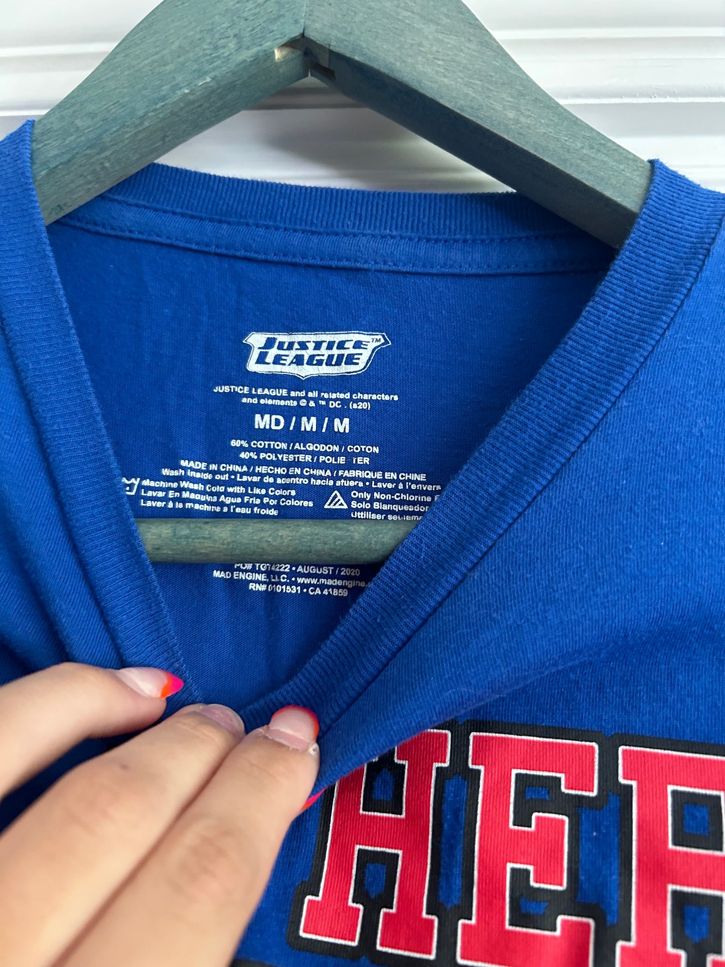 136 EUC super hero shirt size M