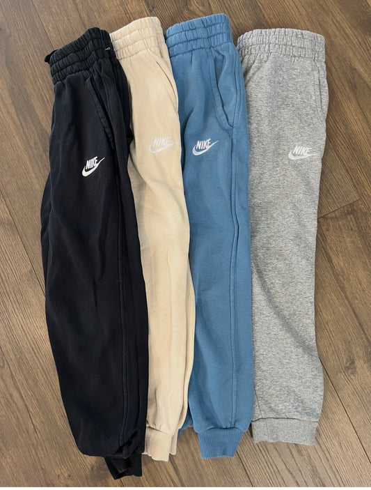 137 (4) pairs of boys youth small Nike sweatpants black, tan, blue, and grey EUC