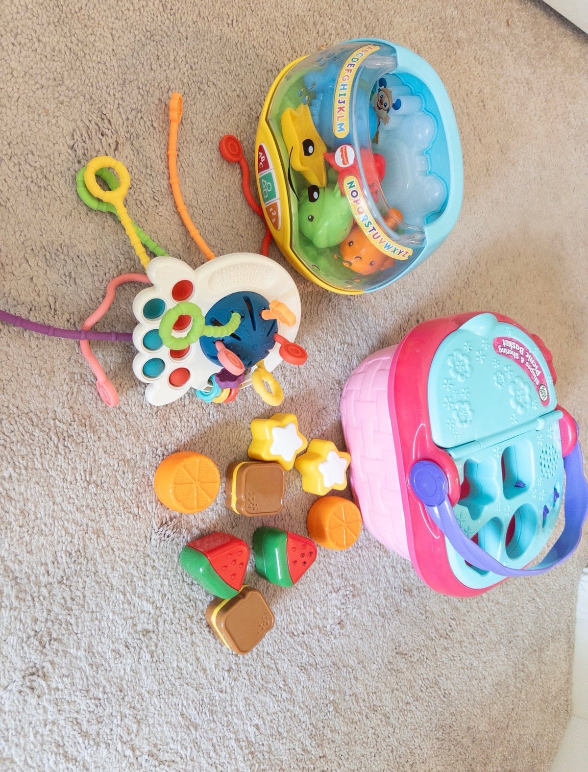 #36- Toys with fishes, string toy, and picnic basket and shapes