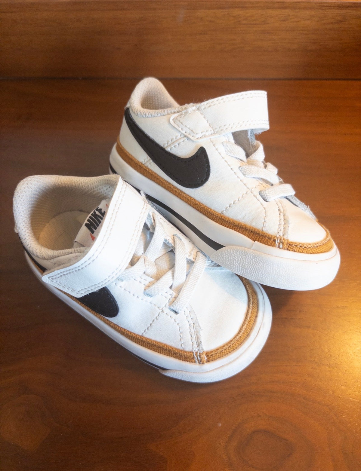 #36 Boys size 4 tan/black Nike shoes EUC