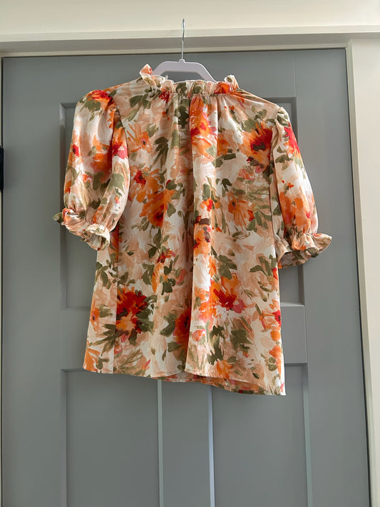 136 EUC women’s floral top small