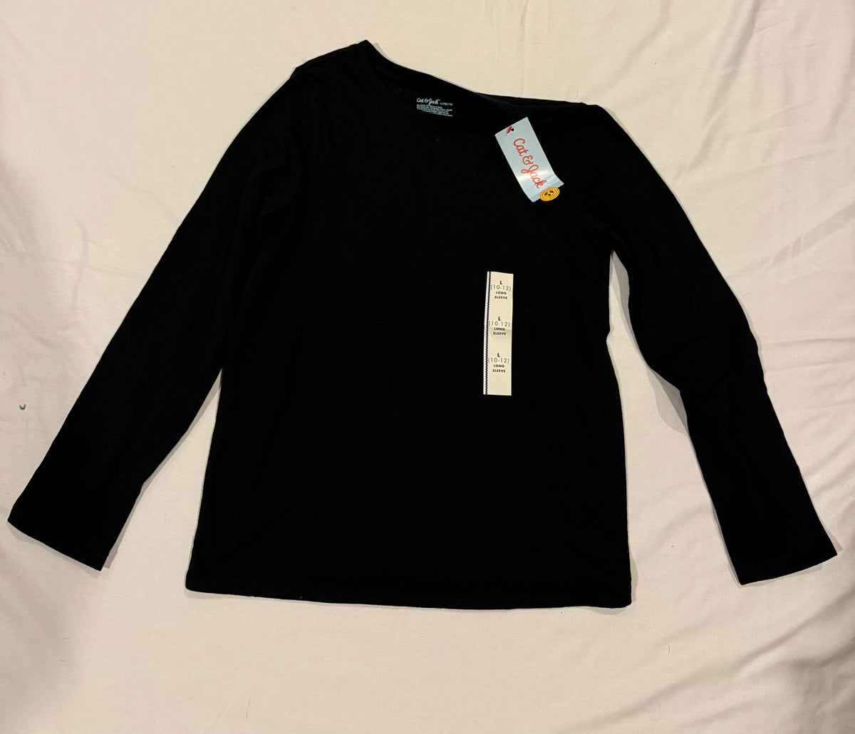 Seller #142 Girls size 10/12 Cat & Jack long sleeved t-shirt