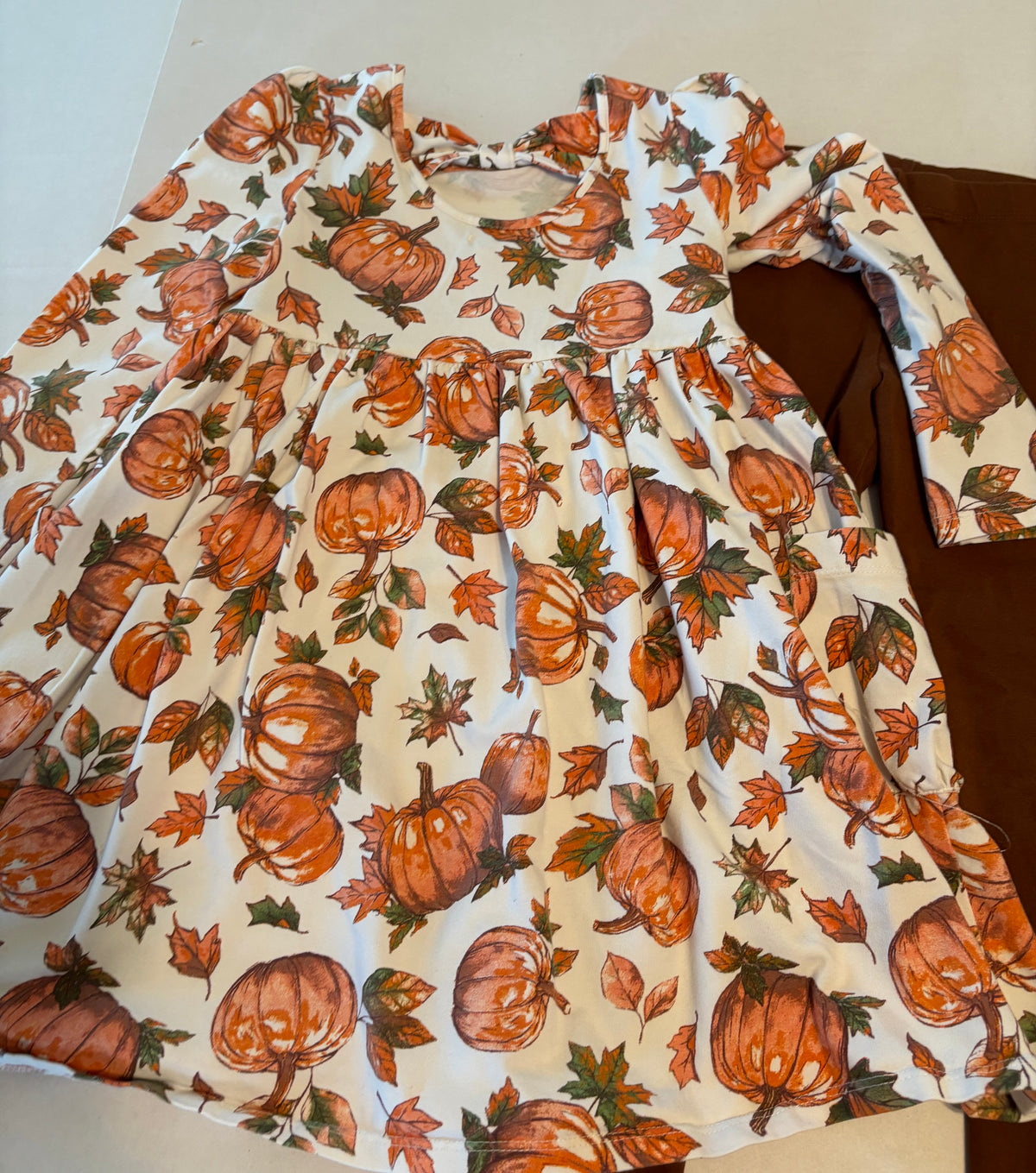 #25 Girls size 6 Flapadoodles pumpkin / fall themed outfit with long sleeve dress with cute bow detail on back and brown leggings