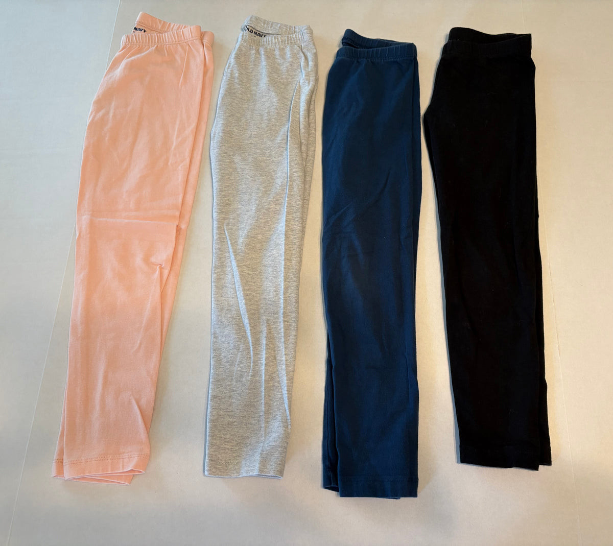 #25 Girls 6T Old Navy set of 4 leggings - light pink, gray, navy blue and black