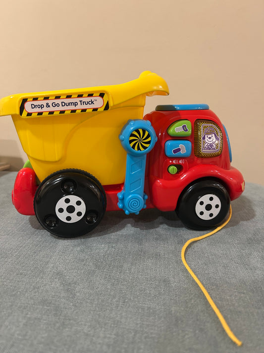 Seller 128 - VTech Dump and Go Dump Truck w/Balls