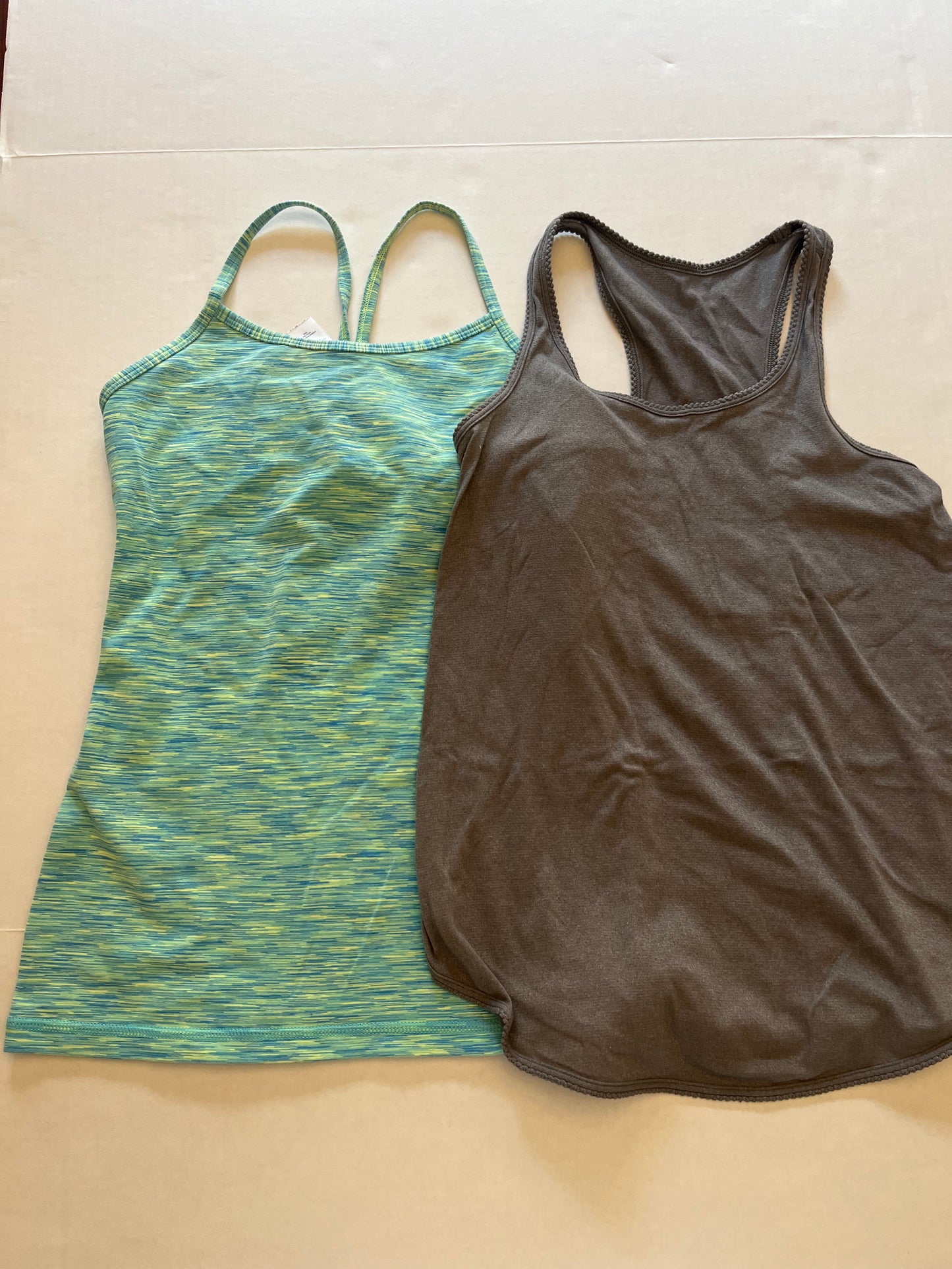 Seller 148 EUC IVIVIA tank in gray size 10 (no tag, fits like 10) and green tank with built in bra size 12(fits like 10)