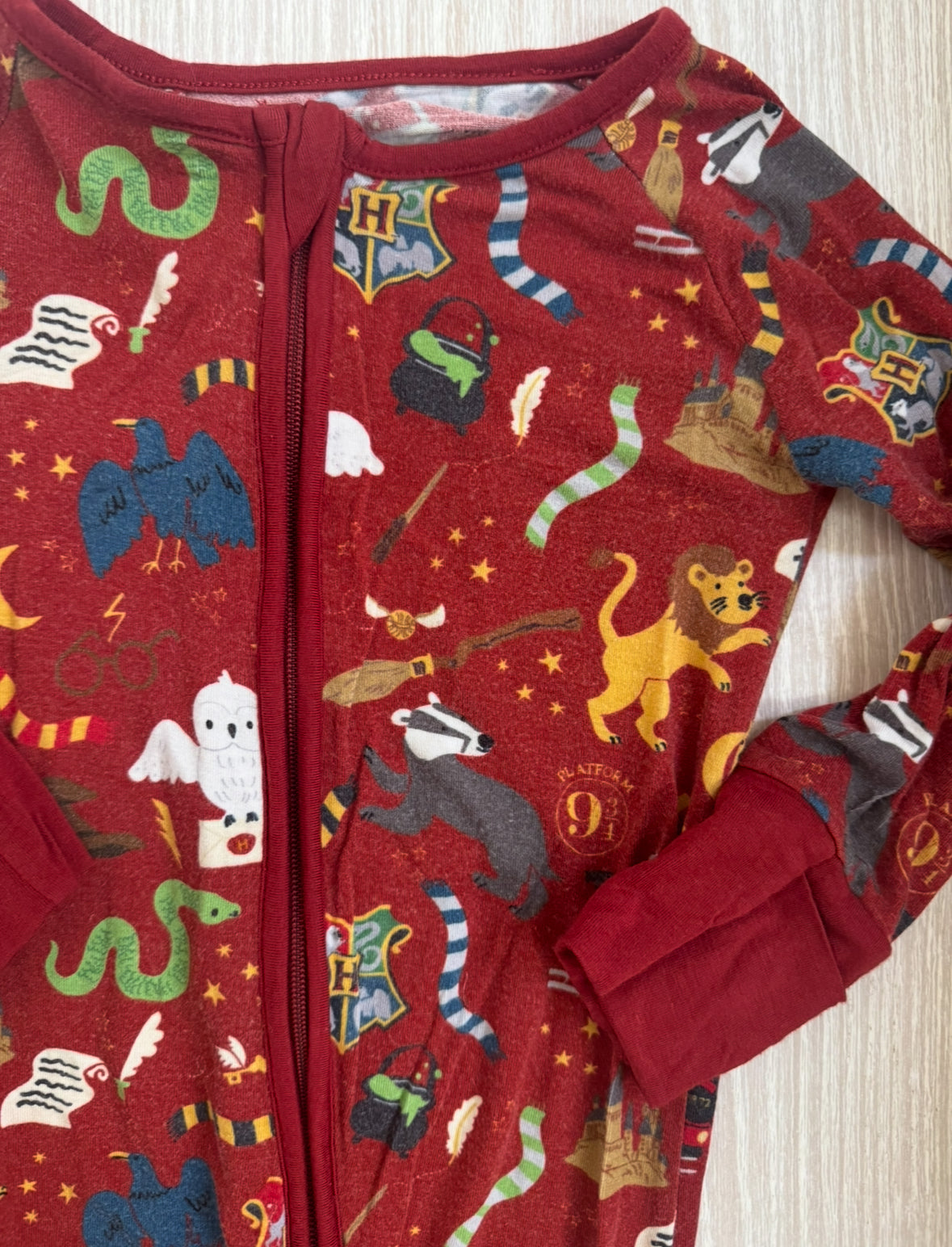 #207 Little Sleepies Harry Potter zippy 6-12 Months - light fading due to color