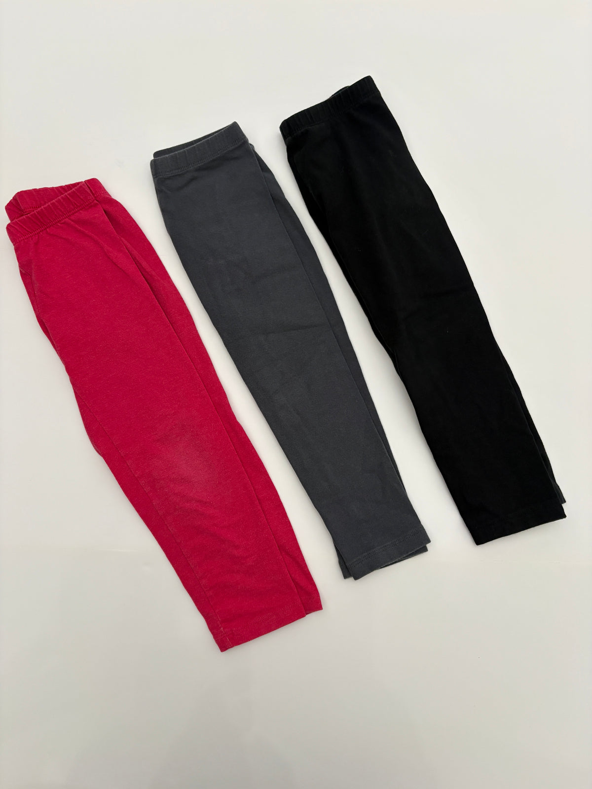#121 girls 4T set of 3 leggings dark pink, dark gray, black. GUC