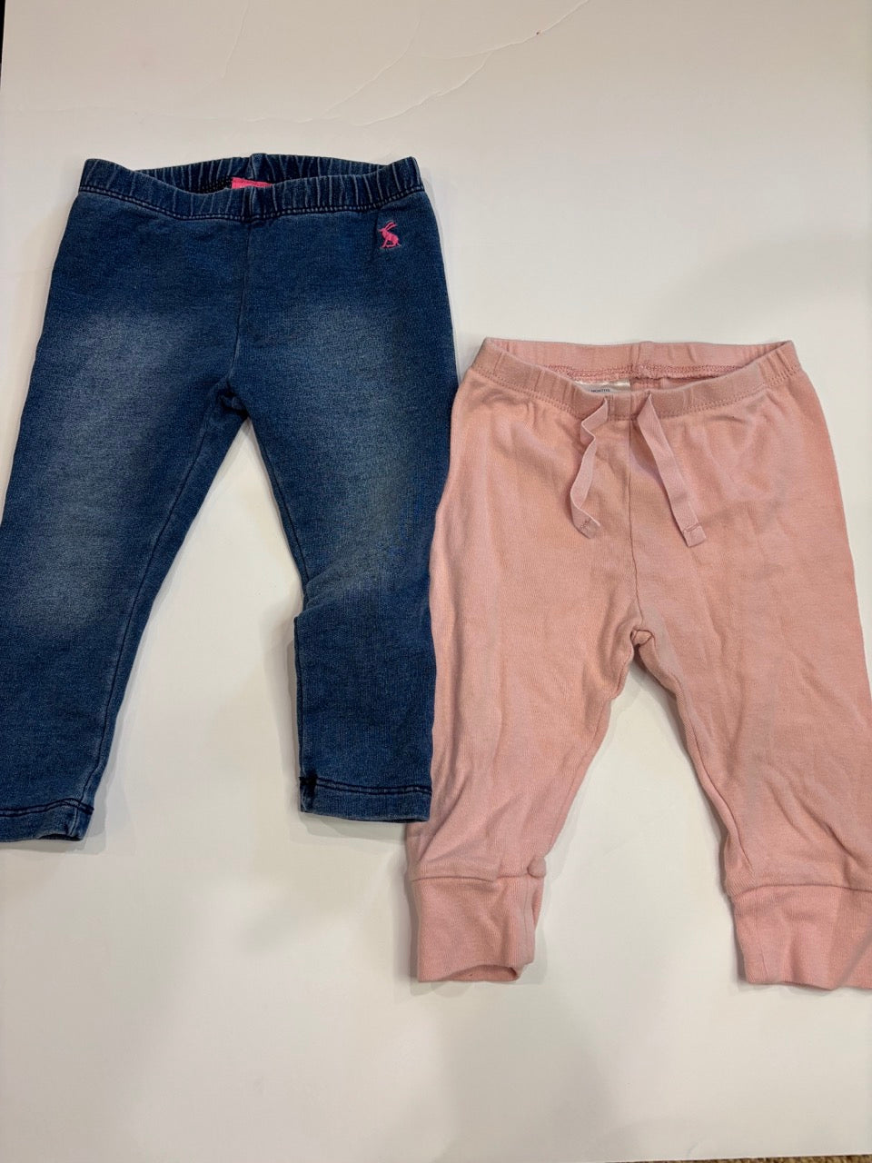 #86A girls 6-9mo joules (jeans) and 6-12mo baby gap pants (pink)