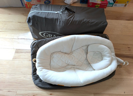 #103 Graco Pack and Play with bassinet and infant lounger