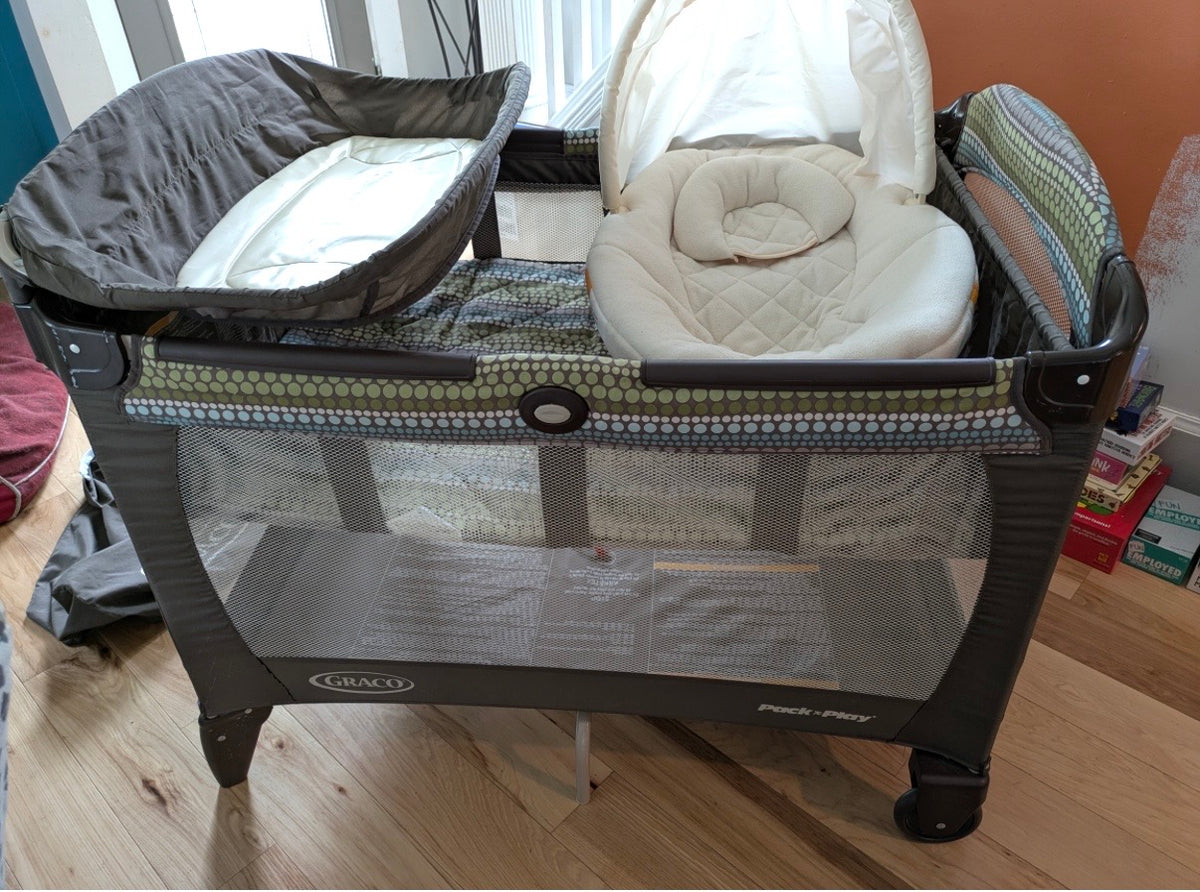 #103 Graco Pack and Play with bassinet and infant lounger